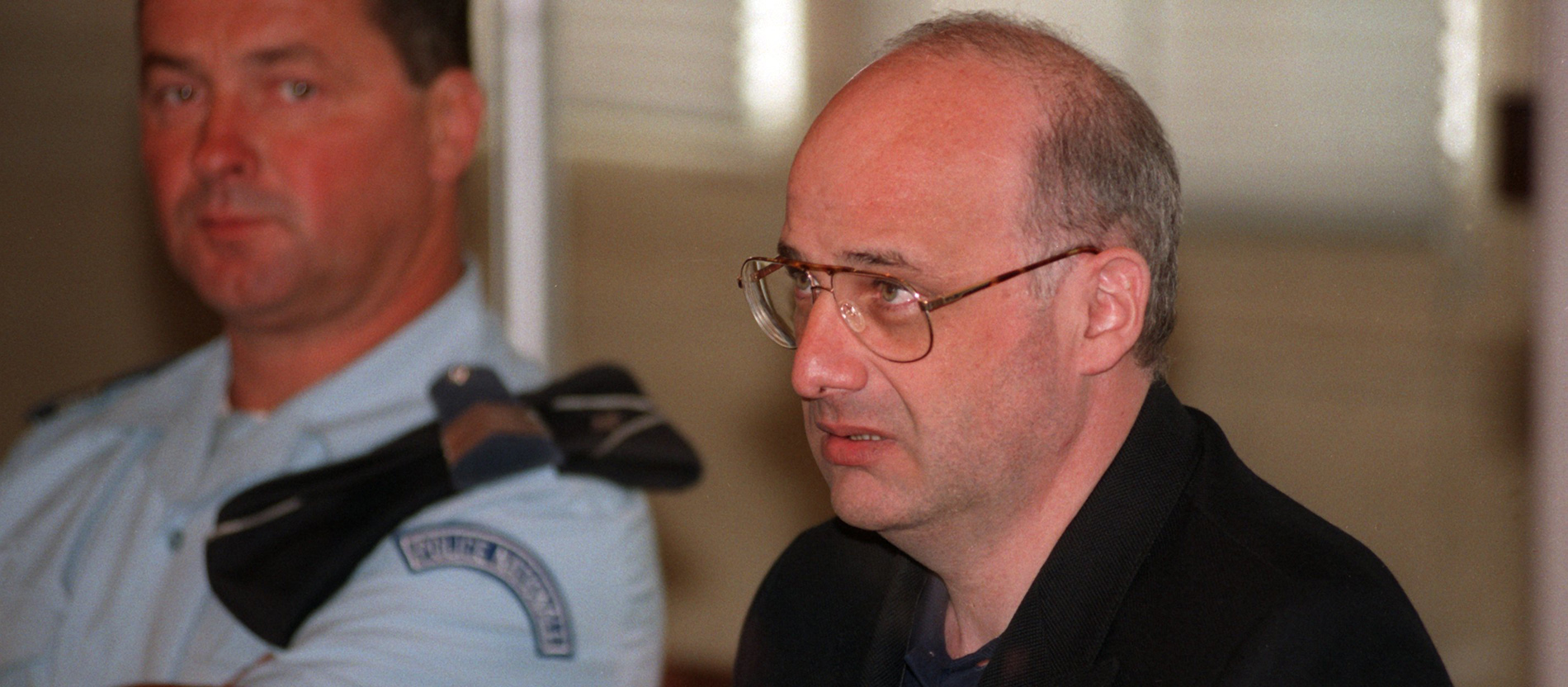 Der Serienmörder Jean-Claude Romand bei Prozessbeginn 1996