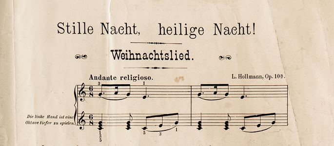 Ein Notenblatt mit den Noten zum Weihnachtslied "Stille Nacht, heilige Nacht".