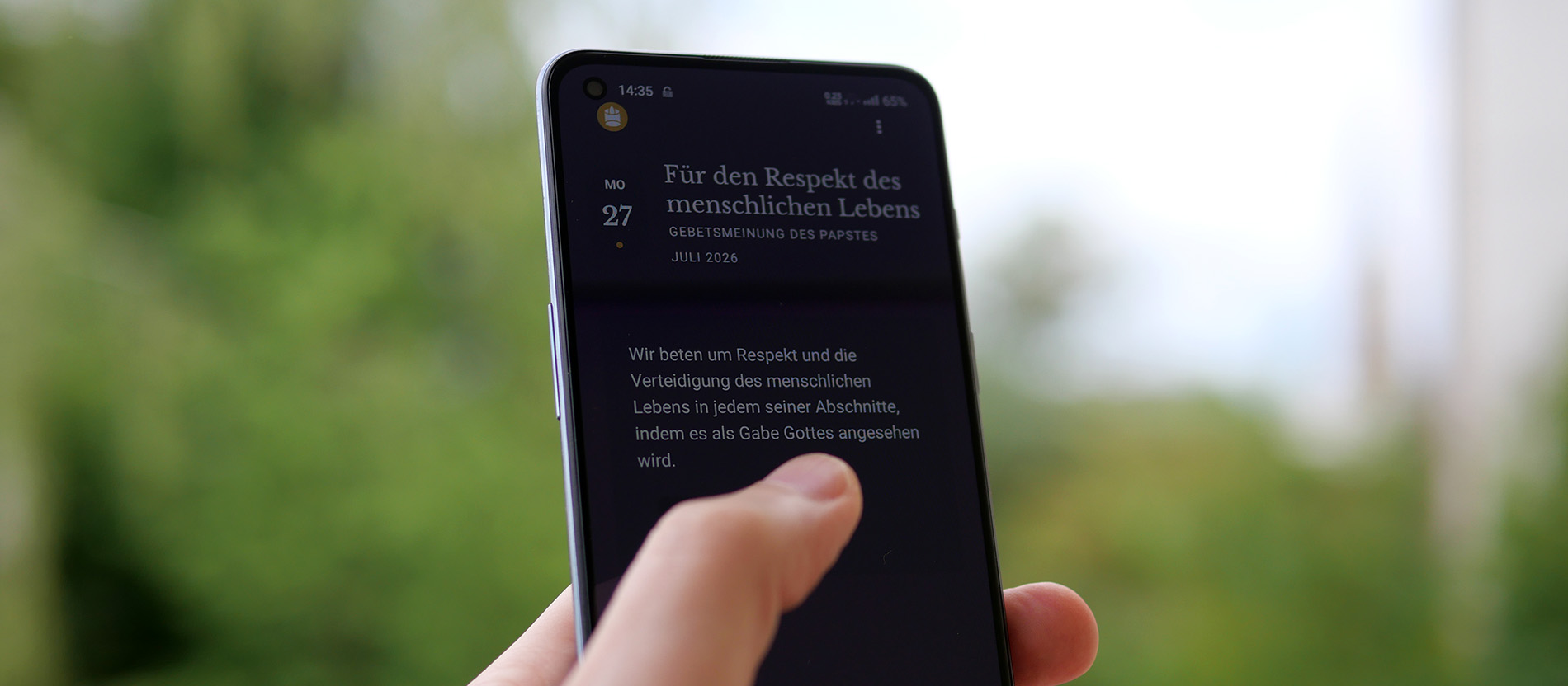 Handy mit der App "Click to Pray"
