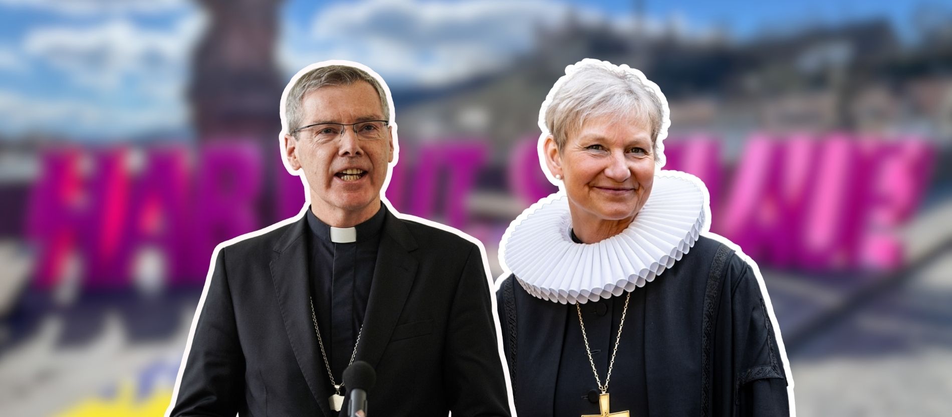 Bischof Heiner Wilmer und Bischöfin Kirsten Fehrs vor dem Katholikentags-Schriftzug