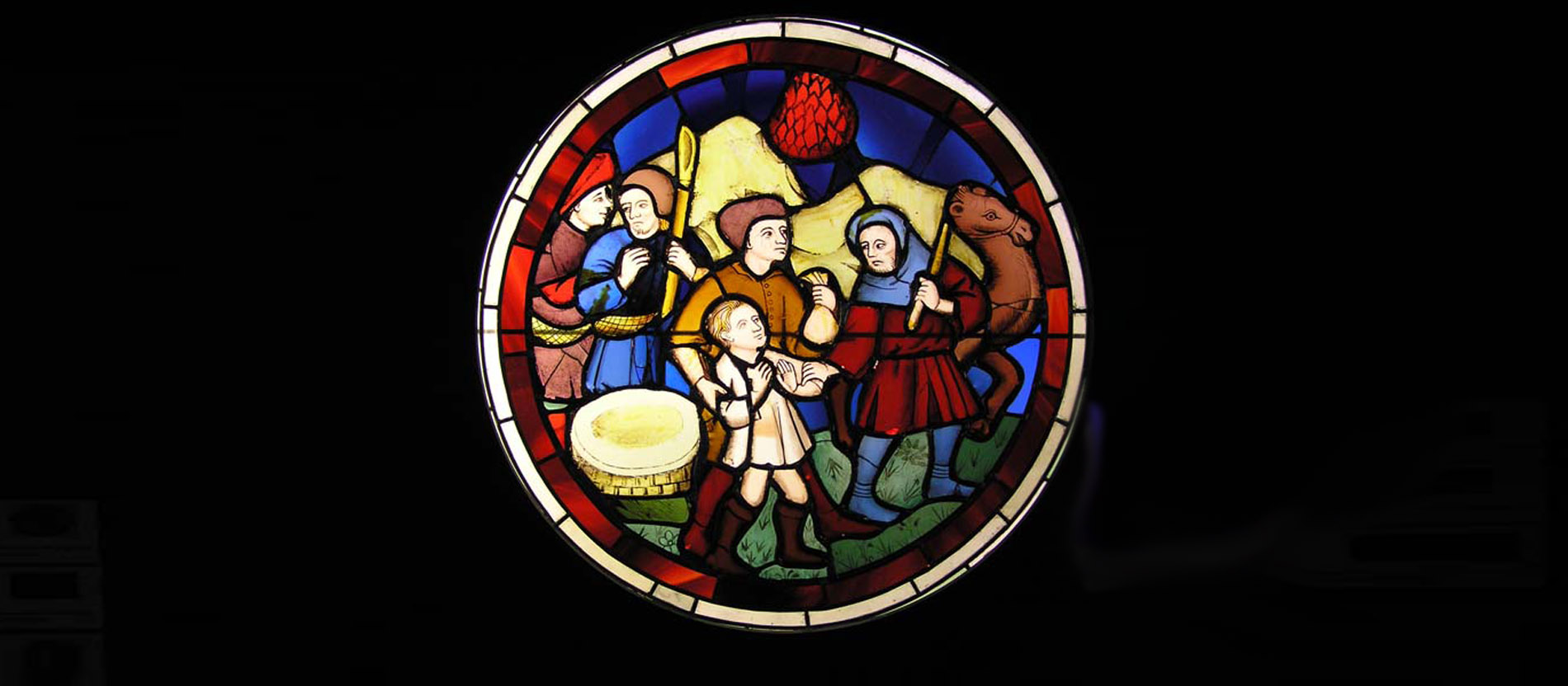 Ein Glasfenster aus der Sainte-Chapelle de Paris zeigt Josef, wie er von seinen Brüdern verkauft wird.